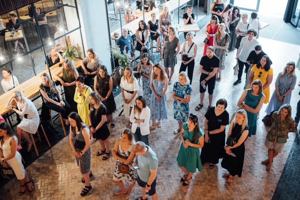 Women at a Riga TechGirls hosted TechMentor closing event in June, 2022.