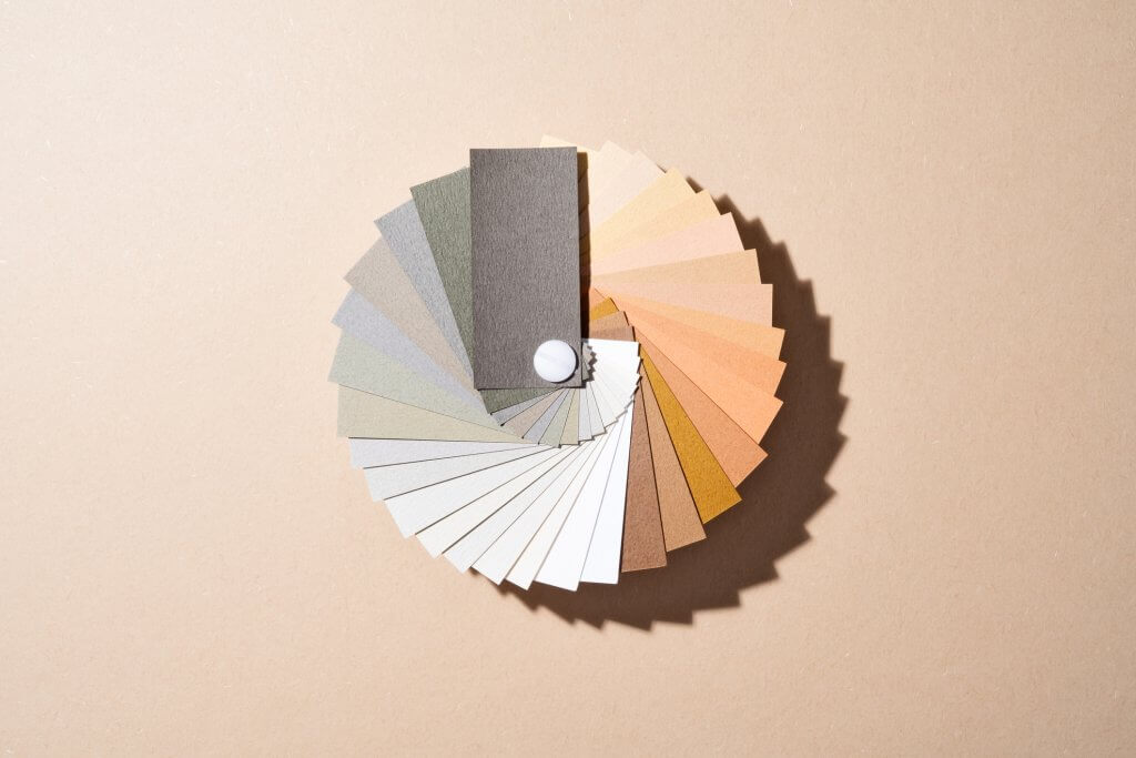 Brown Gray Paper Color Swatch on Brown Colored Background.